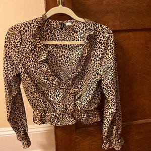 Leopard print women’s blouse, from H & M. Gathers at waste & wrists w/ruffles.